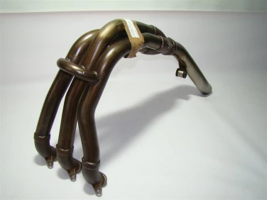 Kolanko kolektor wydech triumph 955i daytona 97-06r